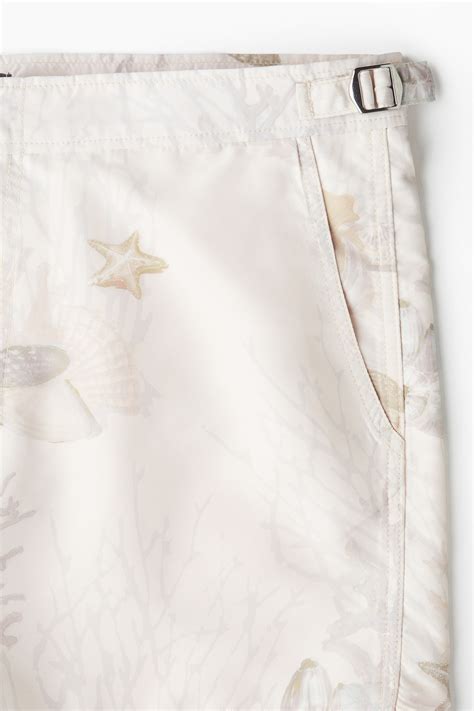Patterned swim shorts - Light beige/Marine life - Men | H&M IN