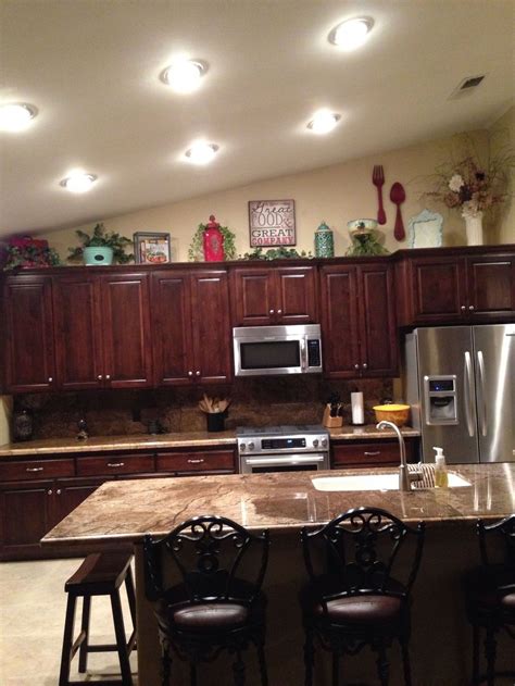 Outstanding Circle Of Rejoice | Decorating above kitchen cabinets ...