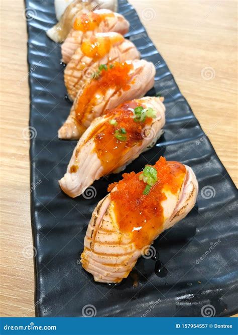 Set of Salmon Sushi Topped with Sweet Sauce and Salmon Roe Stock Image ...