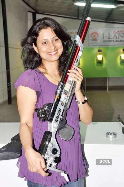 Known Indian shooter Anjali Bhagwat gets ready during the launch of ...