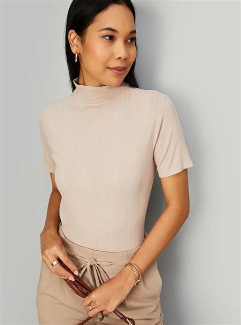 Buy Women Ribbed High Neck T-shirt Online at just Rs. 799.0 ...