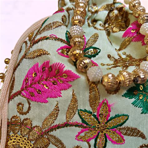 Golden Embroidery Work Batwa/Potli - Buy Jain Golden Embroidery Work ...