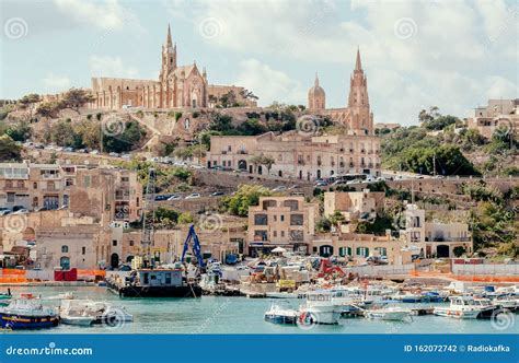 Gozo Island Port View with Fishing Boats and Old Churches on a Hill ...