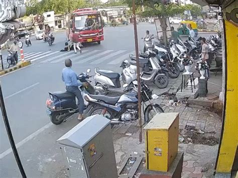 Ahmedabad AMTS Bus Accident: Girl Screams as Tire Narrowly Misses Her