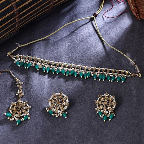 Sukkhi Traditional Gold Plated Reverse AD & Pearl Green Necklace Set f