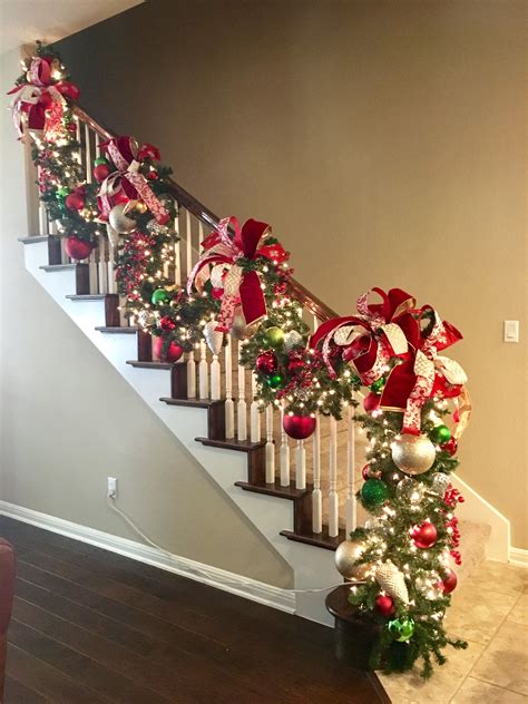Christmas Stairs Decorations with Red, White, and Green Bows