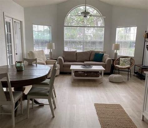 Style Selections Allen+Roth Sierra Pale Oak 8-mm T x 8-in W x 50-in L ...