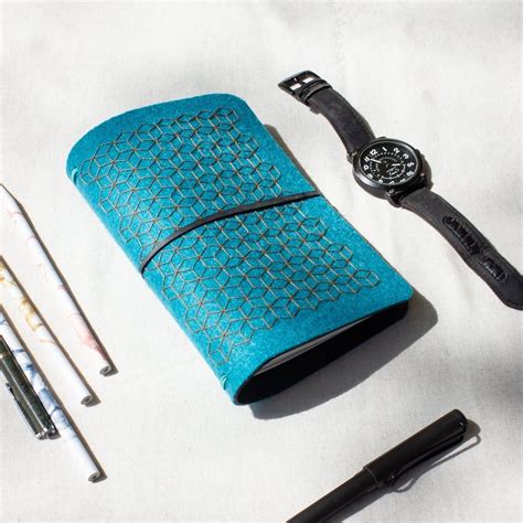 Multipurpose pouches - Upcycled tyre tube, waste wood and recycled fel ...