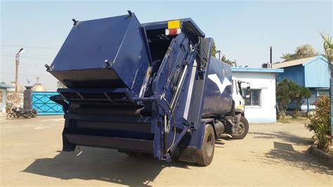 Image result for Front Load Garbage Compactor