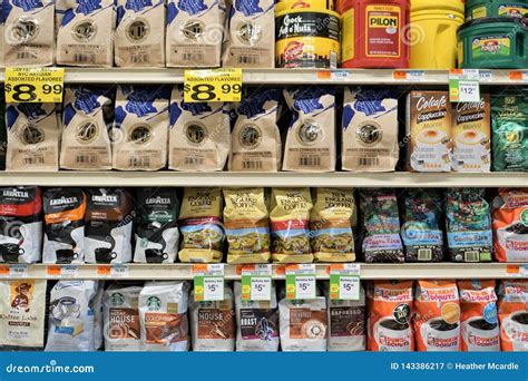Bags of Ground Coffee and Beans on Supermarket Shelves Editorial ...