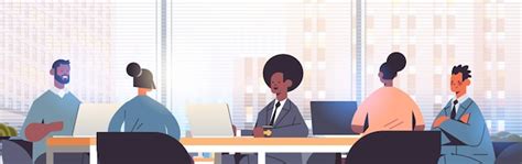 Businesspeople sitting at round table mix race business people team ...