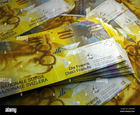 Money of Switzerland. Swiss franc bills. CHF banknotes. 10 francs. Business, finance, news ...