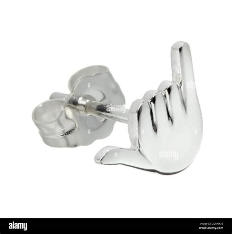 Silver shaka symbol earring designed by Wendy Brandes photographed on a ...