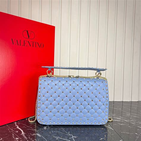 valentino garavani Kadin canta rockstud spike zimbali gold aksesuarli ...