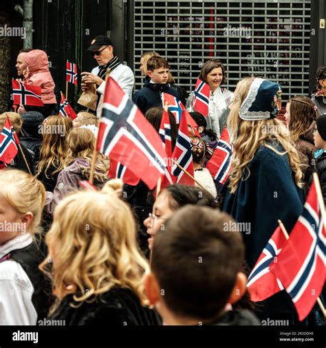 Sandnes, Norway, May 17 2023, Group Of Men Women And Children Carrying ...