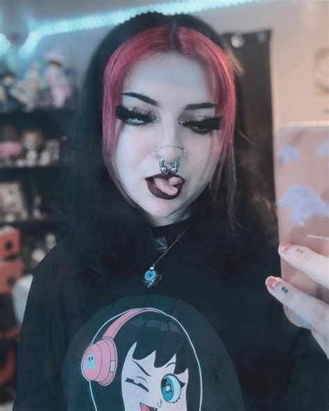 Tongue split and stretched septum feature from... - All the Piercings and Body Mods!