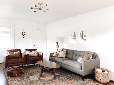 grey floors brown leather couch