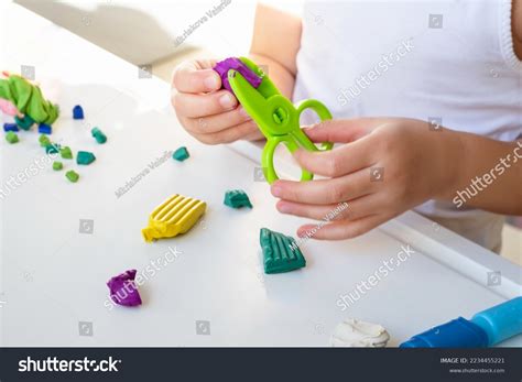 Image result for Child Using Scissors