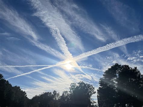 X marks the spot. What is going on in the sky? Is something behind the sun in this pic? Would we ...