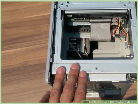 How to Install a CD Disc 的图像结果