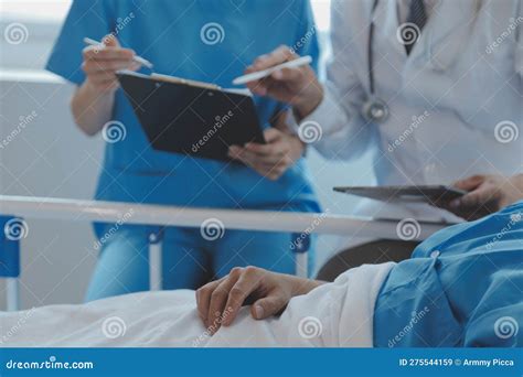 Injured Patient Showing Doctor Broken Wrist and Arm with Bandage in ...