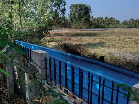 Bengaluru Civic Issues: Builder erects a compound wall at ...