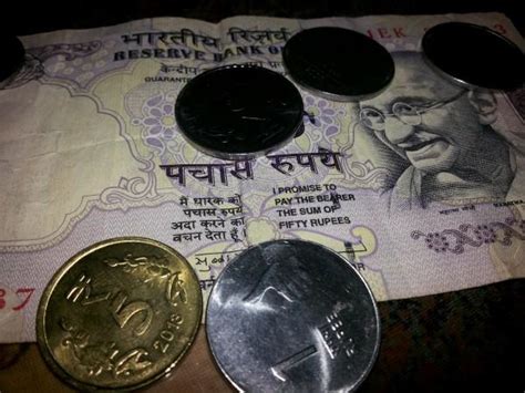 Rupee Slides to 20-month Low, May Correct More on Equity Outflows ...