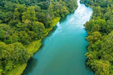 A breathtaking landscape with a beautiful river charming air and lush ...