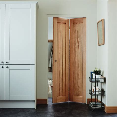 Howdens on Instagram: “Save space by fitting our Genoa oak bi-fold door ...
