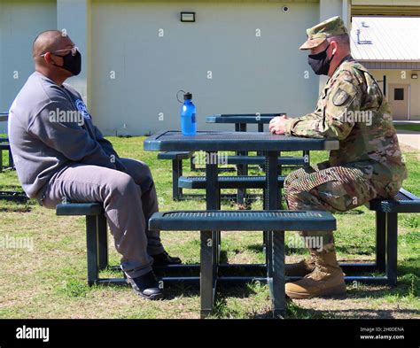 Sgt. Jason Pope mentors a candidate during the acclimation phase at the ...