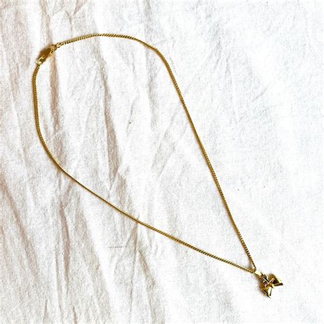 Courreges Gold×Silver Ribon motif logo Necklace | CARBOOTS