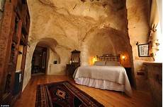 Cave Houses by Fancy Spending A In A Boot Shaped House Or A Clock Cave Houses