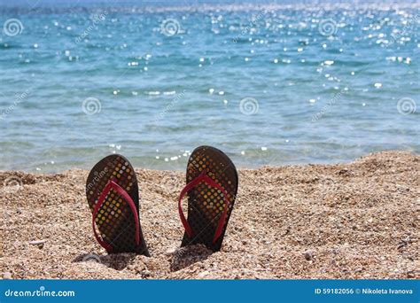 Thongs on the beach stock photo. Image of white, clean - 59182056