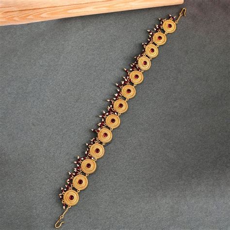 Buy Voylla Abharan Gold Plated Red Stones and Pearls Maang Tikka Online