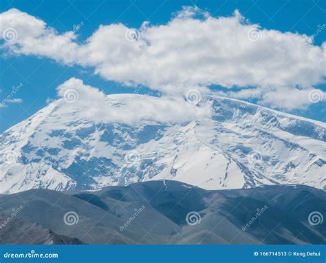 Great Snow-capped Mountain Peak of Mount Muztag Ata on the Pamirs ...