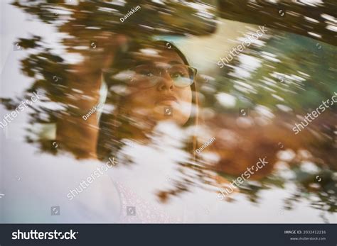 Young Spanish Woman Adjusting Rear Mirror Stock Photo 2032412216 ...