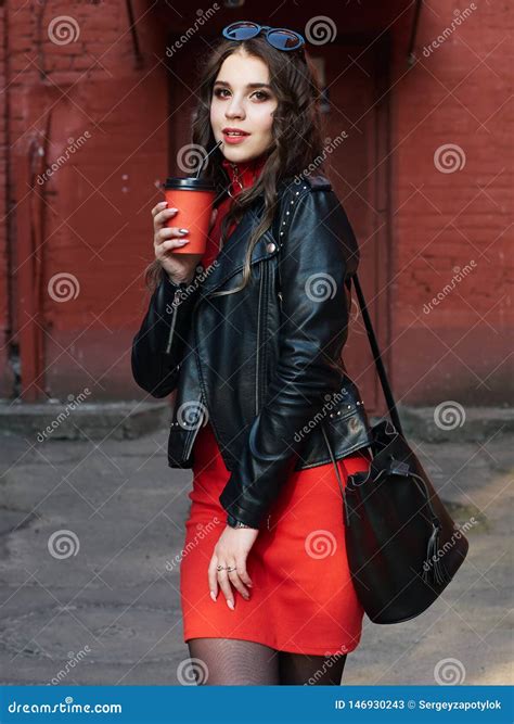 Portrait of a Young Happy Curly Brown-haired European Girl Dressed in ...