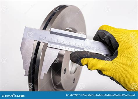 Measuring Brake Discs with a Caliper. Car Parts Workshop Measurements ...