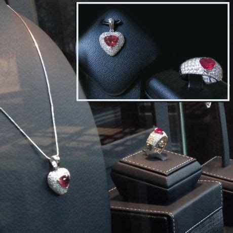CRAFF Jewellery necklace and ring with natural Ruby, completely covered ...