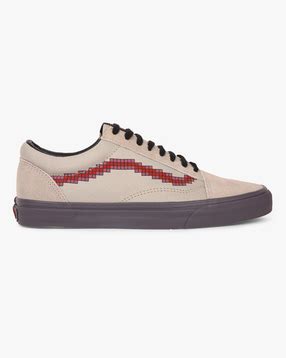 Buy Vans shoes online at AJIO - Get stylish casual shoes for women & men
