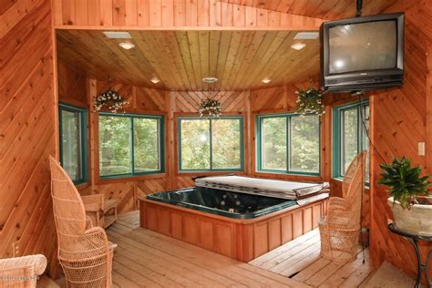 pool house with hot tub