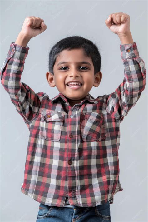 Premium Photo | An Indian child feeling proud on a studio background
