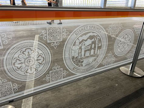 Disney Springs Orange Parking Garage Using New Queue Dividers - WDW ...