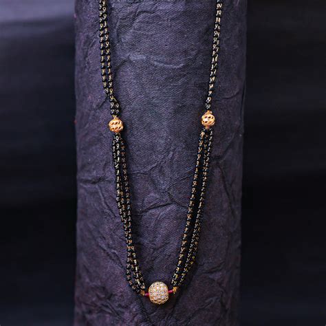 Sukkhi Gold Plated Golden Black Beads Long Mangalsutra Pendant for Wom ...