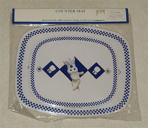 Pillsbury Chef 22706 Doughboy Metal Counter Mat Trivet Set Poppin Fresh 2003 NIP