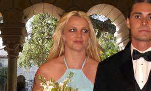 Britney Spears walks down the aisle for the third time... but this time ...