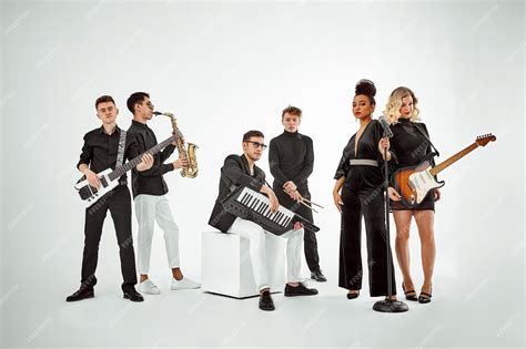 Premium Photo | Multiracial music band on a white background a group of ...