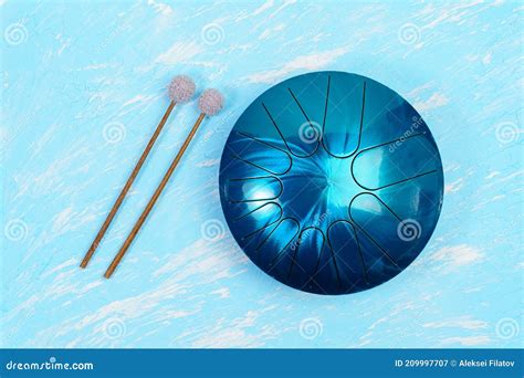Hang Musical Instrument, Glucophone. Metal Tongue Drum, Blue Background ...