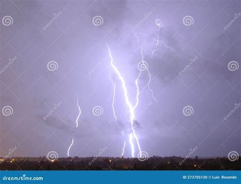 Lightning Streak from a Thunderstorm Cloud at Night in a Rural Setting ...