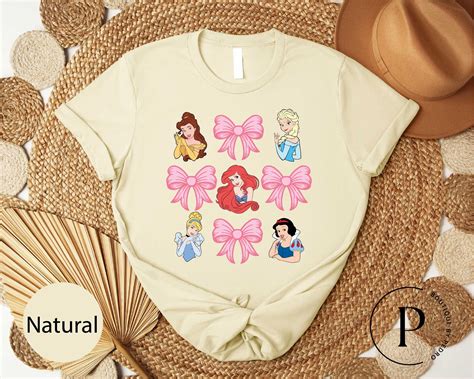 BANJOJO Coquette Bows Disney Princesses Shirt, Ariel Belle Pink Bow Tee ...